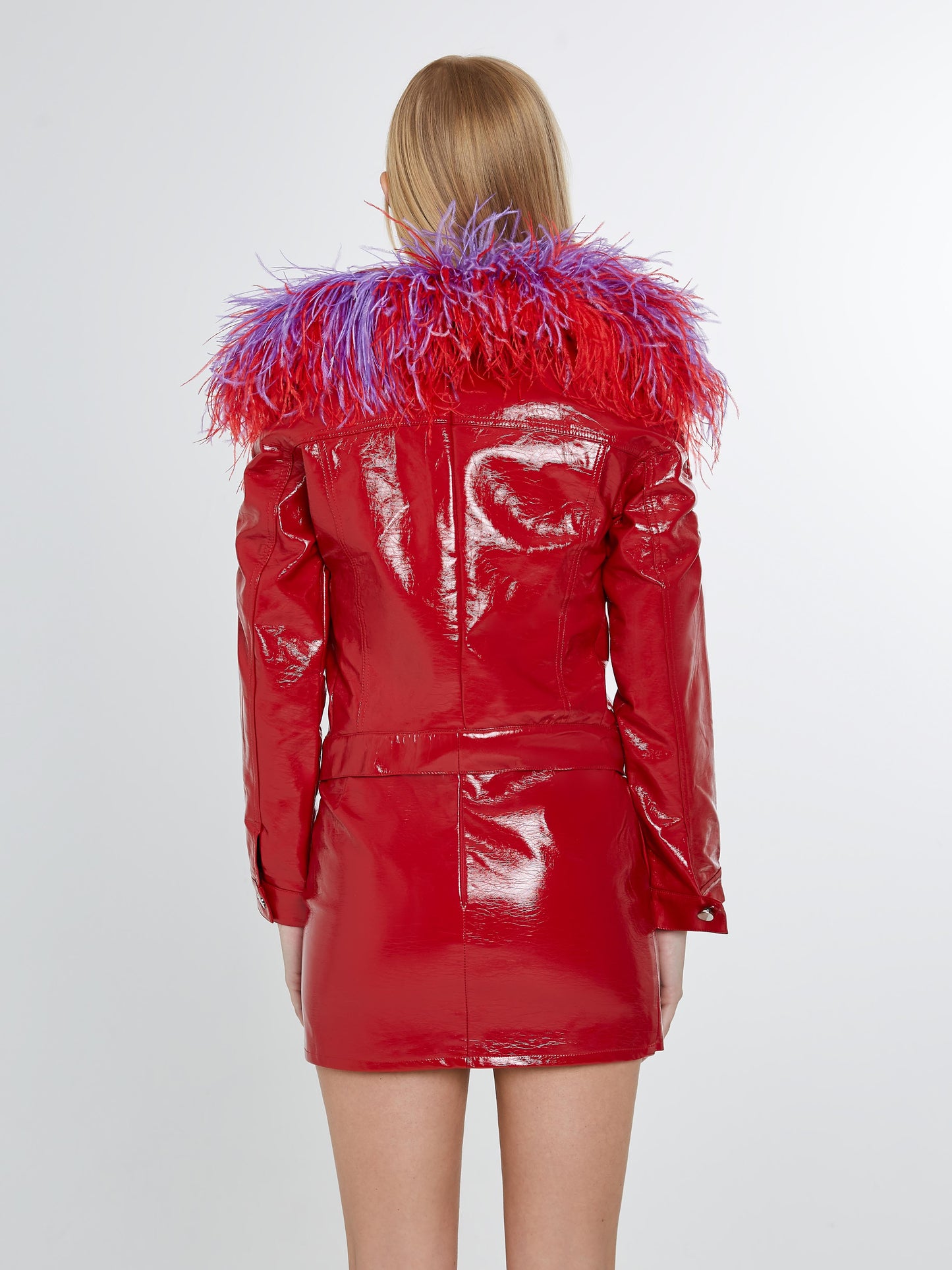 Red vinyl skirt with purple/ red feathers