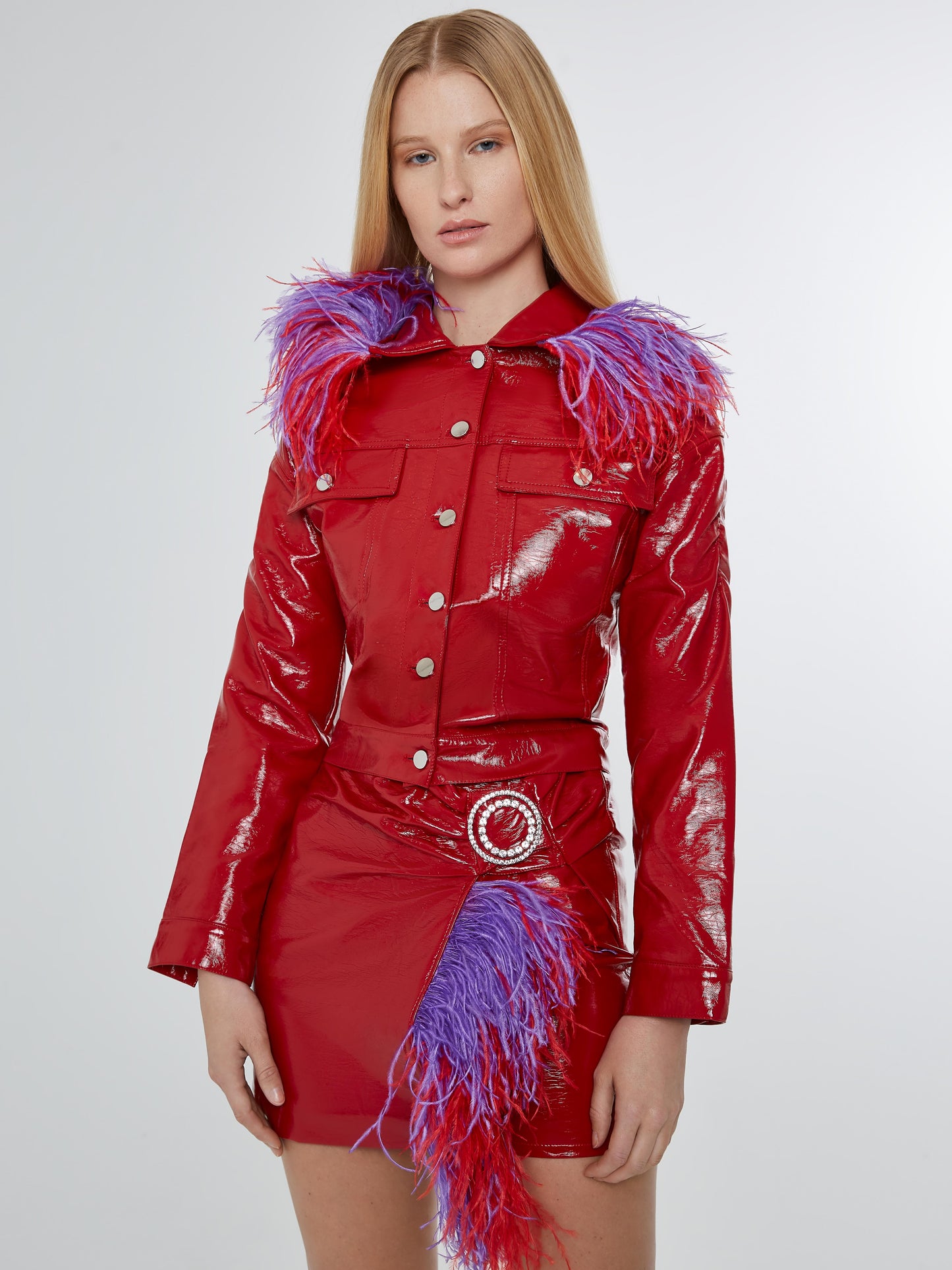 Red vinyl cropped jacket with purple/ red feathered collar