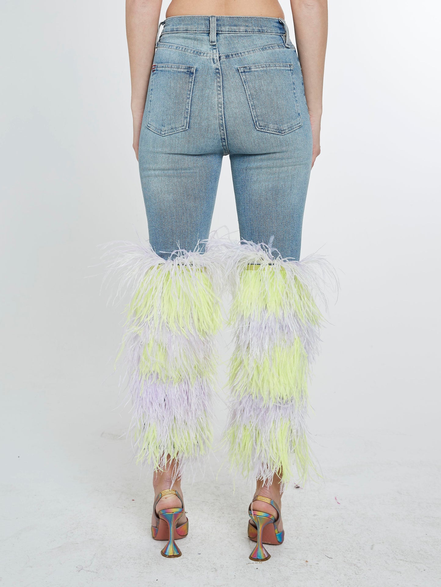 Jeans with neon yellow and purple feathers fringe